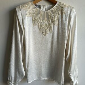 Vintage silky polyester blouse with lace pattern and shoulder pads women’s small
